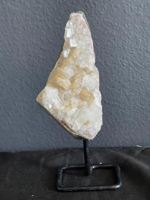 Crystal quartz geode on stand