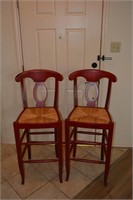 Two Red Bar Stools with Wicker Seats