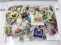 WORLDWIDE – clear box of 100’s of stamps