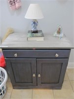 SMALL BLUE CABINET W/ CONTENTS INSIDE AND ON TOP