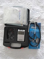 TENS UNIT W/ PADS NEVER USED AND STETHOSCOPE
