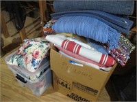 2 BOXES FULL OF RUGS & PILLOWS