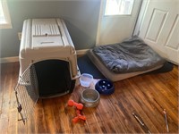 XL dog crate, bowls, toys, bed (corner chewed)
