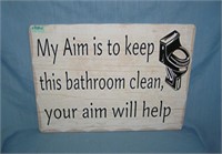 My aim is to keep this bathroom clean your aim wil