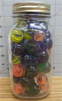 Mason jar full of large size marbles