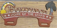 Cast iron Hollywood license plate topper