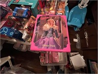 FOUR BARBIE DOLL CASES WITH DOLLS