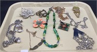 Tray lot of costume jewelry w/money clip quartz