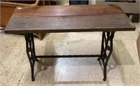 Wrought iron accent table with wooden table top