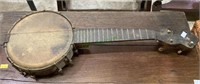 Antique four string ukulele / banjo in poor