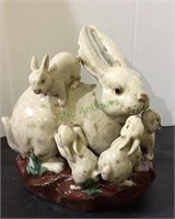 Terra-cotta rabbit with baby bunnies sculpture