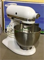 KitchenAid classic mixer with attachments.