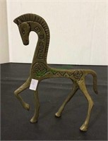 Bronze horse with Aztec carvings measuring 7 1/2