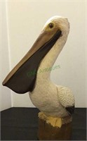 Pelican composite sculpture measuring 13 inches