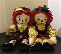 Raggedy Ann and Andy-like dolls in satin and
