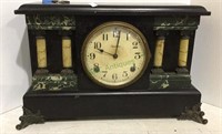 Antique Ingraham mantle clock w/key included.