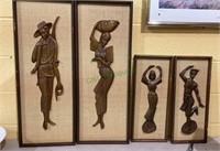 Set of four panels with wooden figurines on
