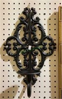 Lightweight metal wall sconce measures 17 inches