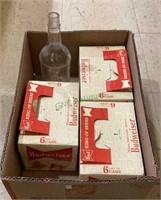 Three unopened boxes of Budweiser 12 fluid ounce
