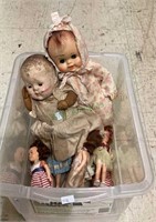 Plastic box of vintage plastic baby dolls.   1918.