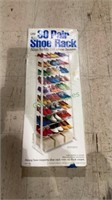 30 pair shoe rack new in box. Also, alternately