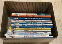 Box is full of Dr. Seuss books including titles
