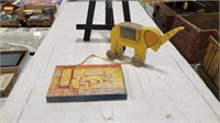 wooden elephant pull toy; sign shop toy