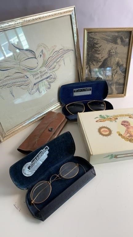 Antique etchings, eyeglasses, Choco cigar box