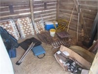 Contents of stall that includes campfire grill,