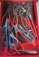 Contents of drawer that includes pliers, Vise