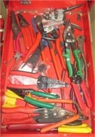 Contents of drawer that includes tin snips, wire