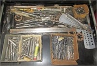 Contents of drawer that includes dies, taps,