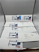 9 US Mint unopened hard envelopes (one opened had