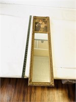 Ornate vintage gold frame mirror