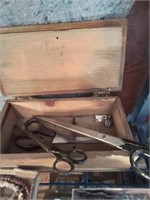Little wooden box of scissors and miscellaneous