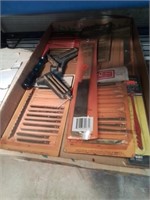 Flat of sawblades and other tool items