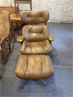 Brown leather armchair with footstool