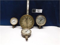4 ANTIQUE GAUGES, 3 ARE BRASS, LARGE HAS NO GLASS
