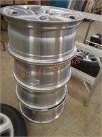 Set of four matching Chevy rims