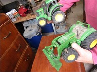 2 john deere plastic toy tractors