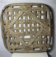 Tobacco basket appears to have writing on the