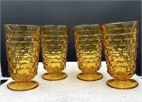 4 heavy glass amber colored cups