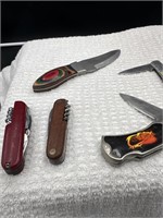 Group of 6 pocket knives including Winchester and