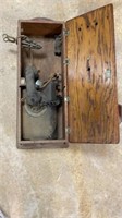 Antique rotary phone and holder