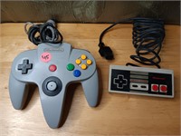 Lot of Two Nintendo game Controllers - large One H