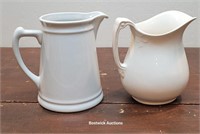 2 White pitchers