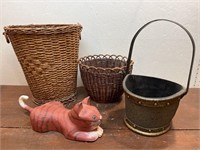 3 baskets and wooden cat figure