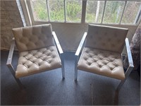 Pair of tufted metal armchairs