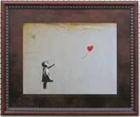 GIRL WITH BALLOON BY GRAFFITI ARTIST BANKSY