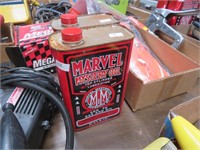 Two Cans of Marvel Mystery Oil